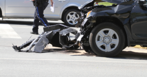 Car involved in motorcycle accident in Hartford with significant front-end damage