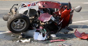 Damaged motorcycle lying on the road after a serious collision in Hartford