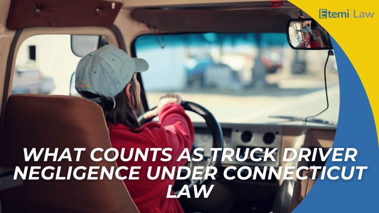 Driver inside truck cab with steering wheel and mirror view introducing truck driver negligence under law