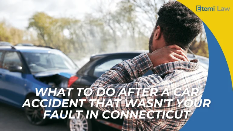 Driver holding neck near damaged cars with text about steps after a not at fault accident in Connecticut