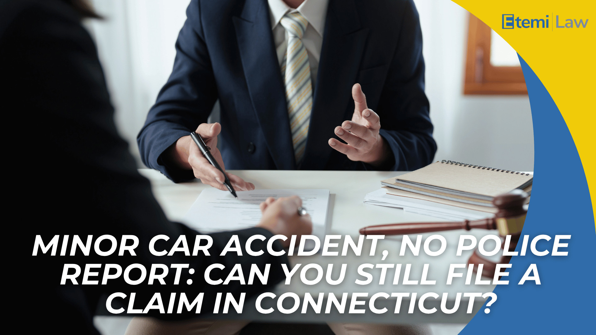 Lawyer reviewing documents across desk introduces filing a claim after a minor accident without police report
