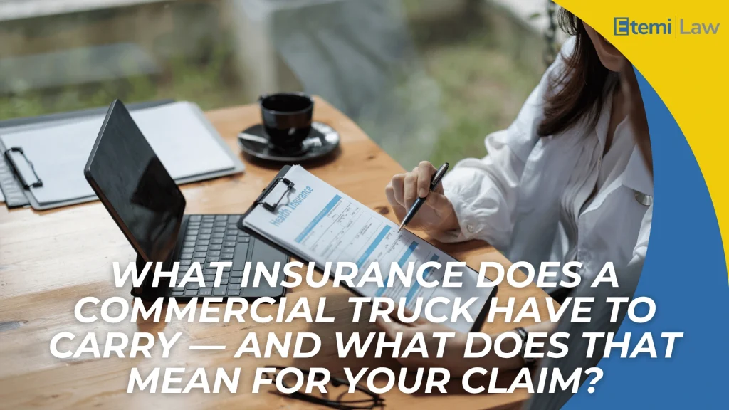 Person reviewing insurance form at desk with laptop and headline about truck insurance requirements and claims