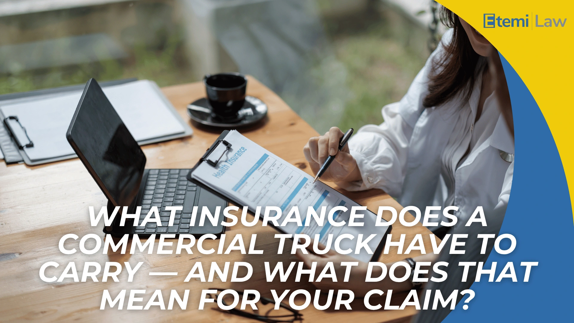 Person reviewing insurance form at desk with laptop and headline about truck insurance requirements and claims