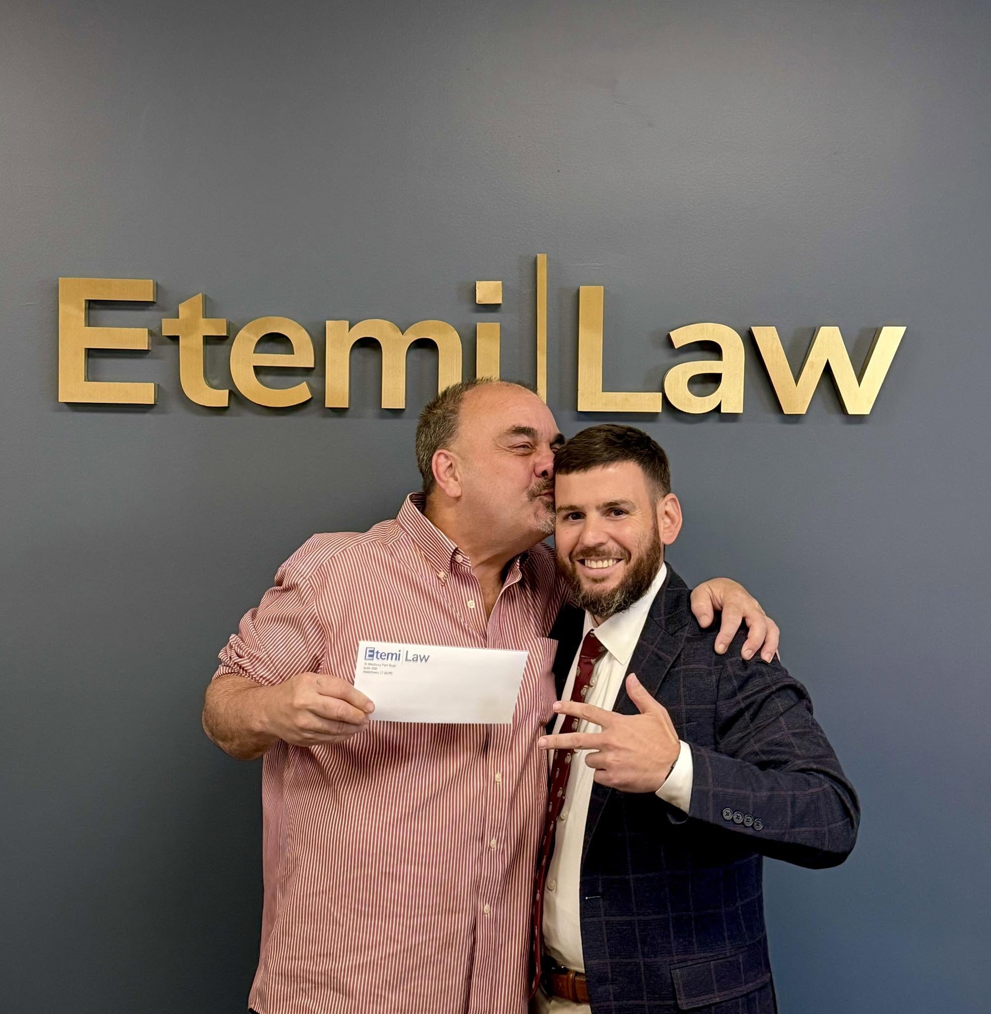 etemi law with client